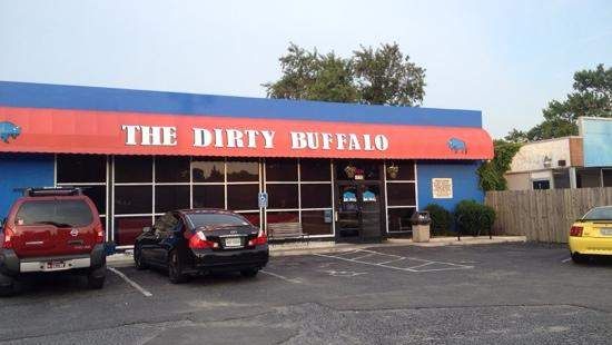 The red and blue storefront of the original Dirty Buffalo wing joint near ODU