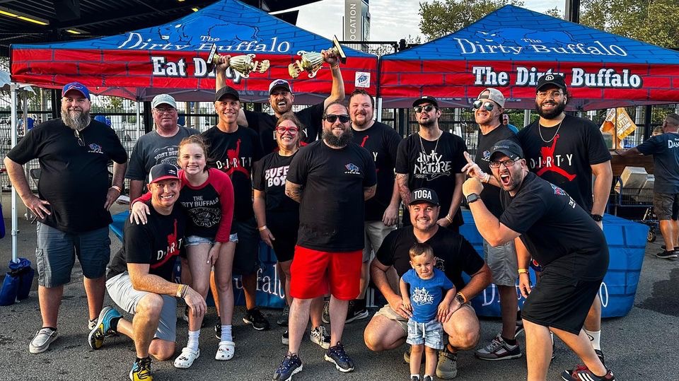 The Dirty Buffalo crew holding trophies at the National Buffalo Wing Festival