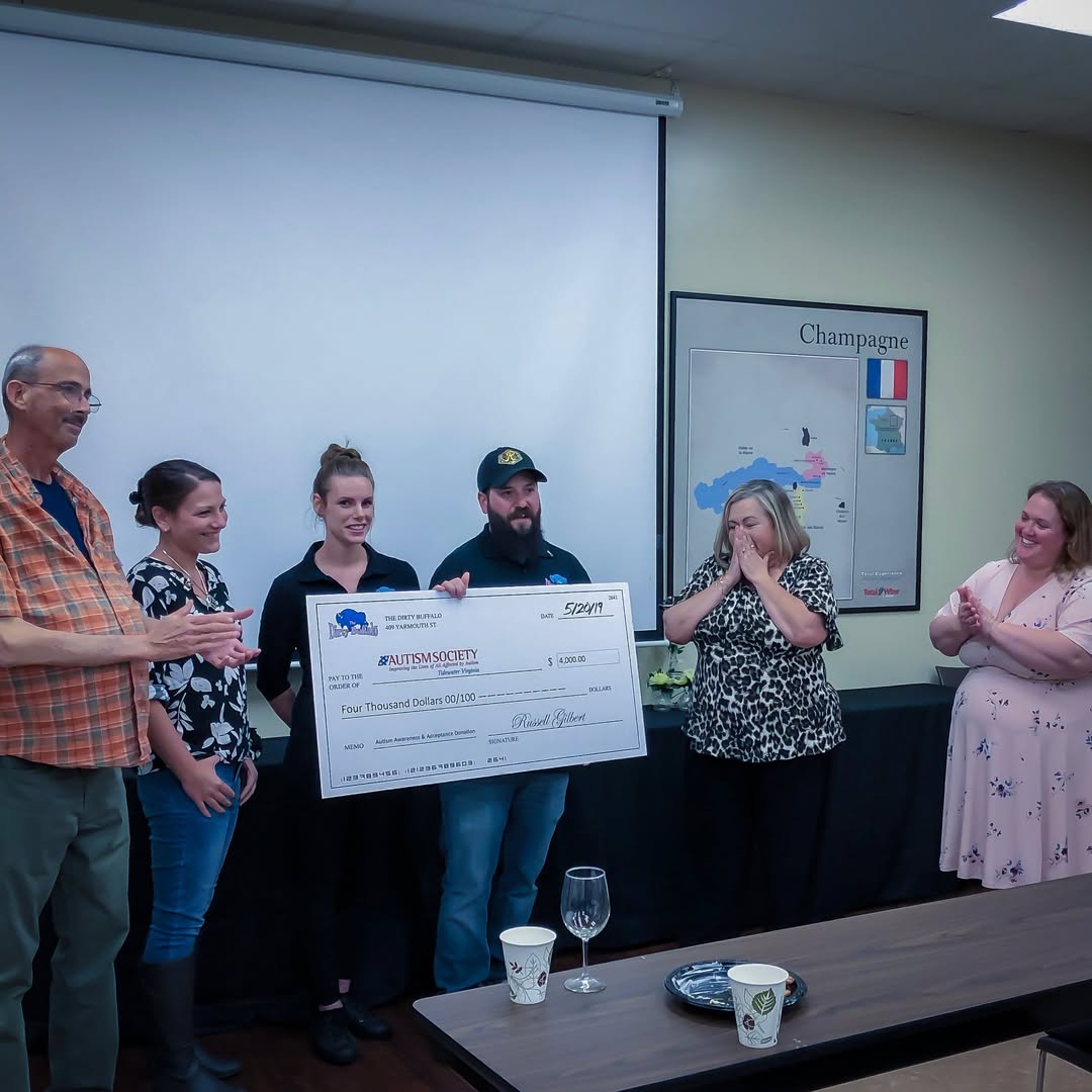 The Dirty Buffalo team presenting a donation check to the Autism Society of Tidewater Virginia