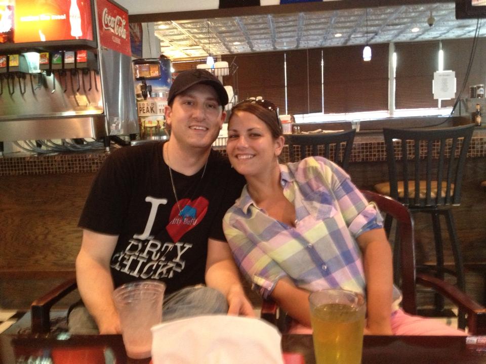 Russ and Steph Gilbert sitting together at the original Dirty Buffalo