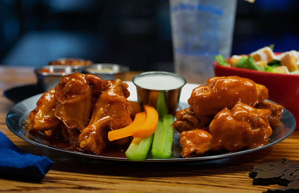 Sauced Bone-In Wings Sauced Bone-In Wings